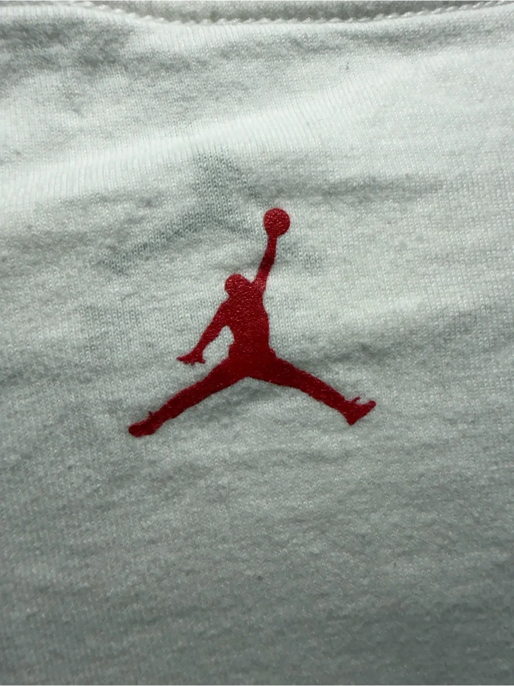 Jordan Men’s White T-Shirt with Red and Black Jumpman Graphic